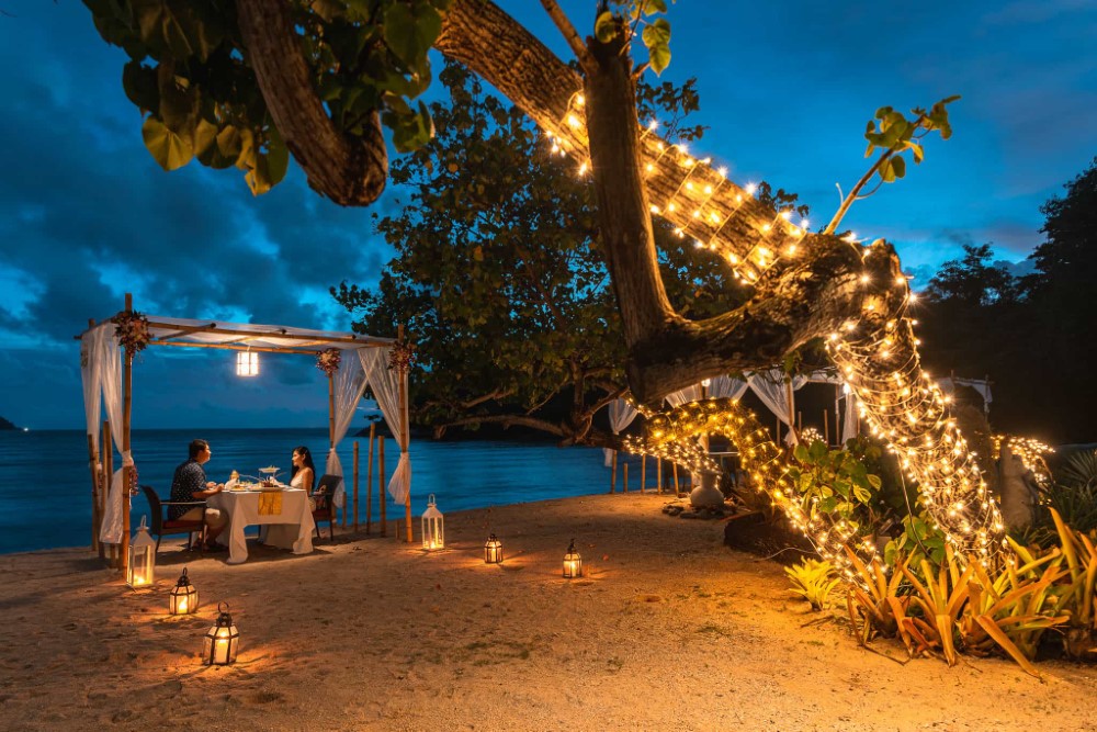 A romantic dinner on our resort’s private beachfront