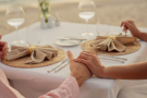 A couple experiencing fine-dining restaurant service near Kamala Beach