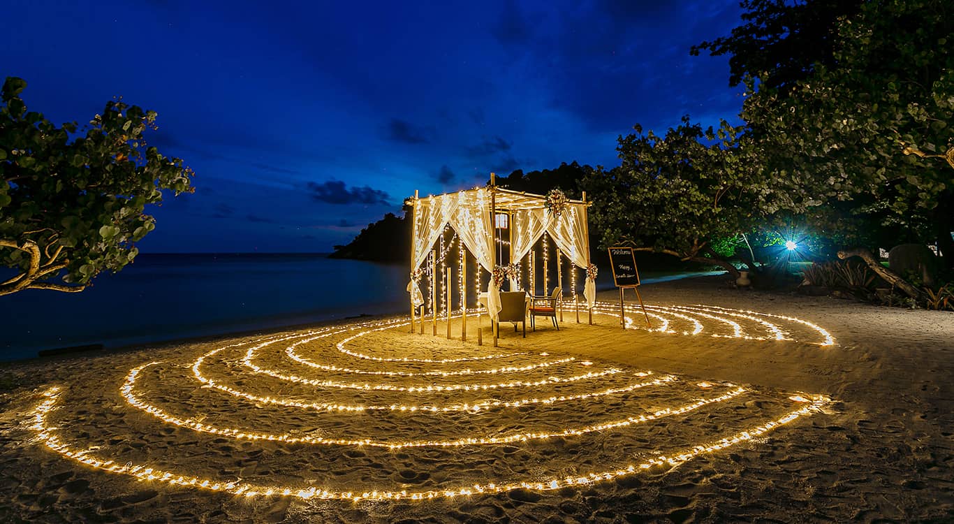 Private candle-lit beach cabana