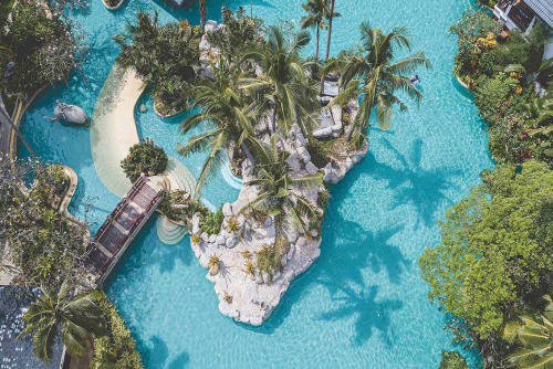 Lagoon pool so big it has its own island in the middle of it