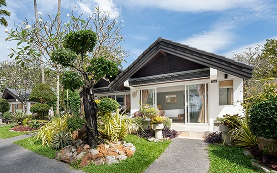 Kamala Beach accommodation with a tropical garden view